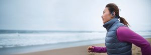 BackBeat_FIT_Woman_Running_on_Beach_rgb-med_04OCT16